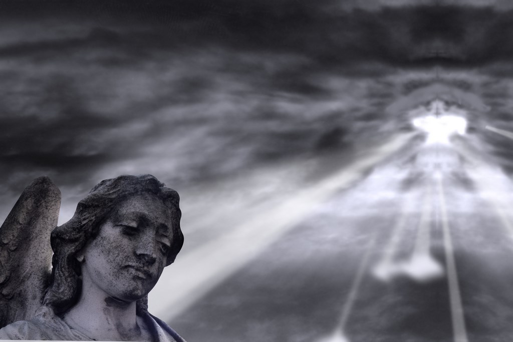 Angel and dramatic Sky