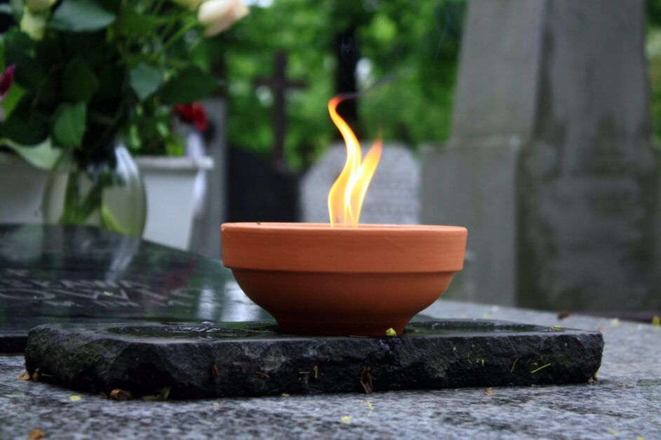 candle burning on cemetery